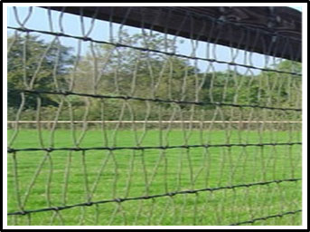 A picture of a metal mesh horse fence.